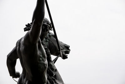 Low angle view of statue against clear sky