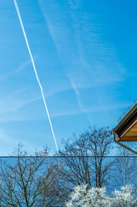 Low angle view of built structure against blue sky