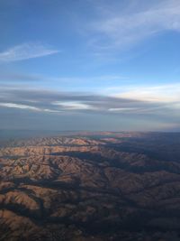 Aerial view of dramatic landscape against sky