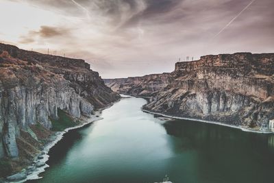 Panoramic view of rock formations against sky