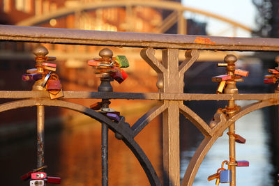 Close-up of metal railing on bridge