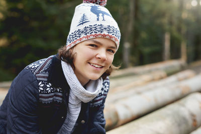 Portrait of smiling young woman in park