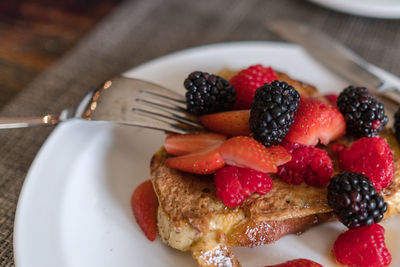 Close-up of french toast and berries