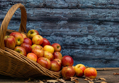 High angle view of apples in basket on table