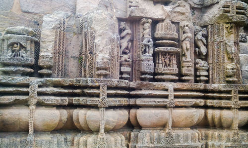 Close-up of statue against temple