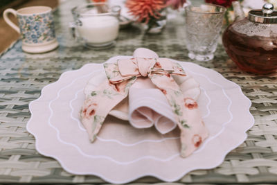 High angle view of white rose on table