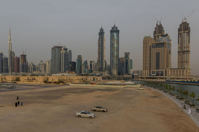 Panoramic view of city buildings against sky