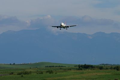 Airliner in representative hokkaido landscape