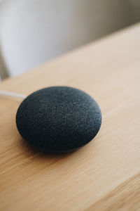 Close-up of modern speaker on table