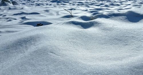 High angle view of snow on sand