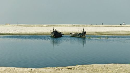 Two boats in ganga river at bhagalpur, bihar, indis