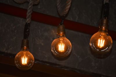 Close-up of illuminated light bulb