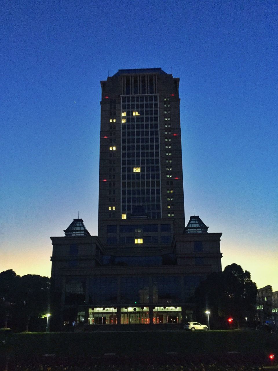 architecture, travel destinations, sky, building exterior, city, illuminated, night, built structure, no people, outdoors, astronomy, skyscraper, star - space, galaxy