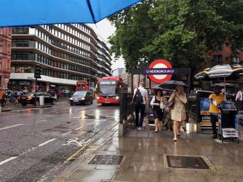 People on street in city