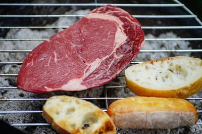 Close-up of meat on barbecue grill