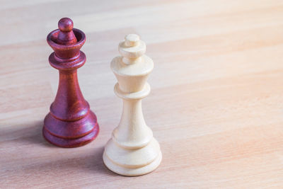 High angle view of chess pieces on table