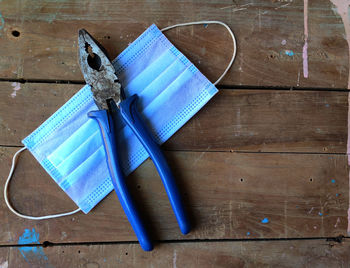 High angle view of blue paper on table