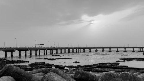 Pier over sea against sky