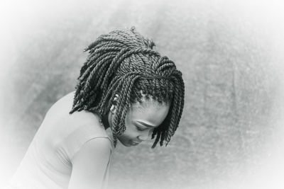 Close-up of woman with braided hair