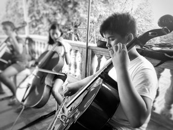 Teenagers playing violins