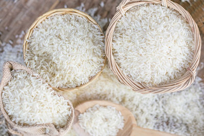 High angle view of rice spilling on table