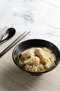 High angle view of noodles in bowl on table