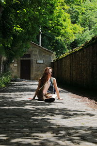 Woman sitting in a garden