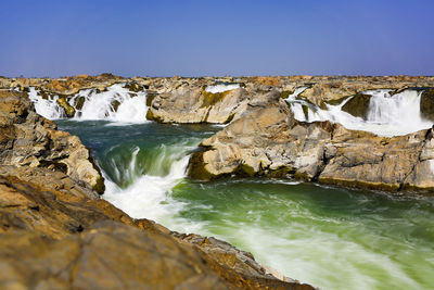 Scenic view of sea against clear sky