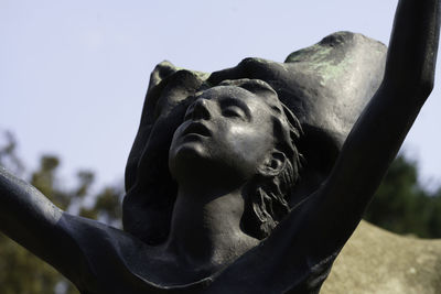 Close-up of statue against sky