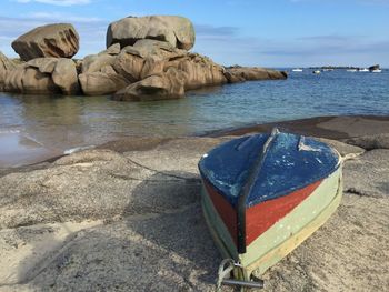 Boat moored at beach