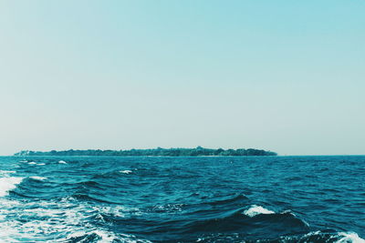 Scenic view of sea against clear sky