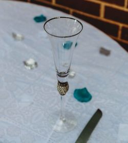 High angle view of wine in glass on table