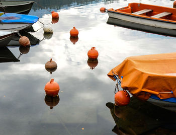 High angle view of boats in sea against sky