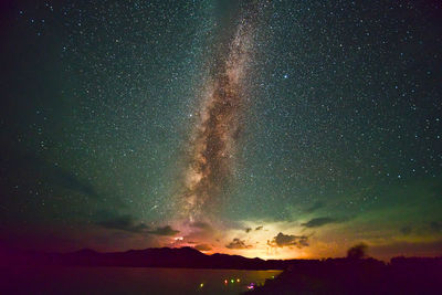 Scenic view of star field against sky at night