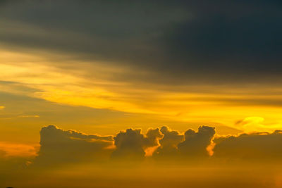 Scenic view of dramatic sky during sunset