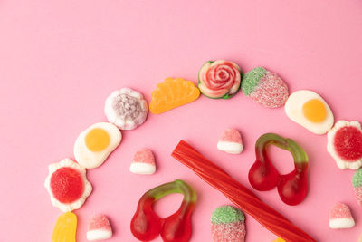 High angle view of multi colored candies on table