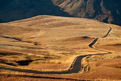 High angle view of road leading towards mountain