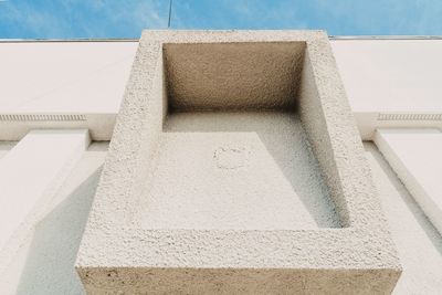 Low angle view of white building against sky
