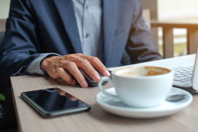 Coffee cup on table