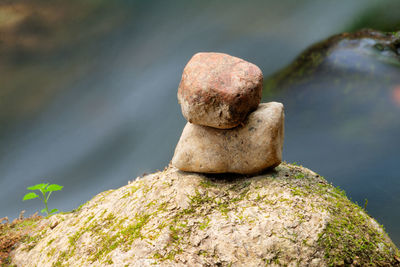 Close-up of stone stack on rock