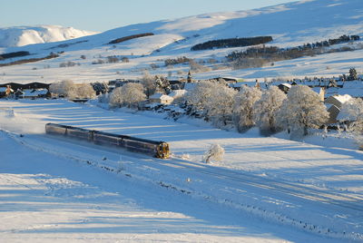 Scenic view of mountains against sky during winter