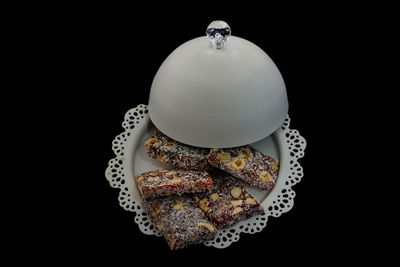 High angle view of dessert against black background