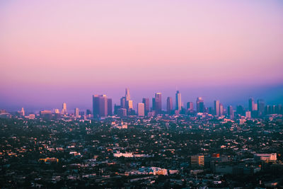 Aerial view of city at sunset