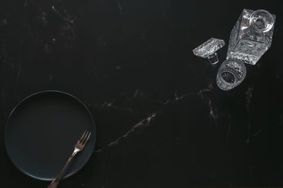 High angle view of electric lamp against black background