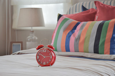 Red roses on bed at home