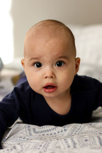 Portrait of cute baby at home