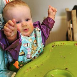 Portrait of cute baby girl at home