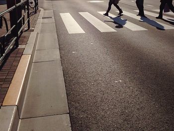 Low section of people walking outdoors