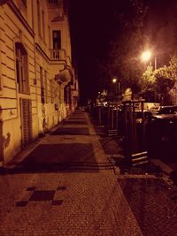 Illuminated street lights at night