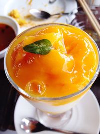 Close-up of mango dessert served on table